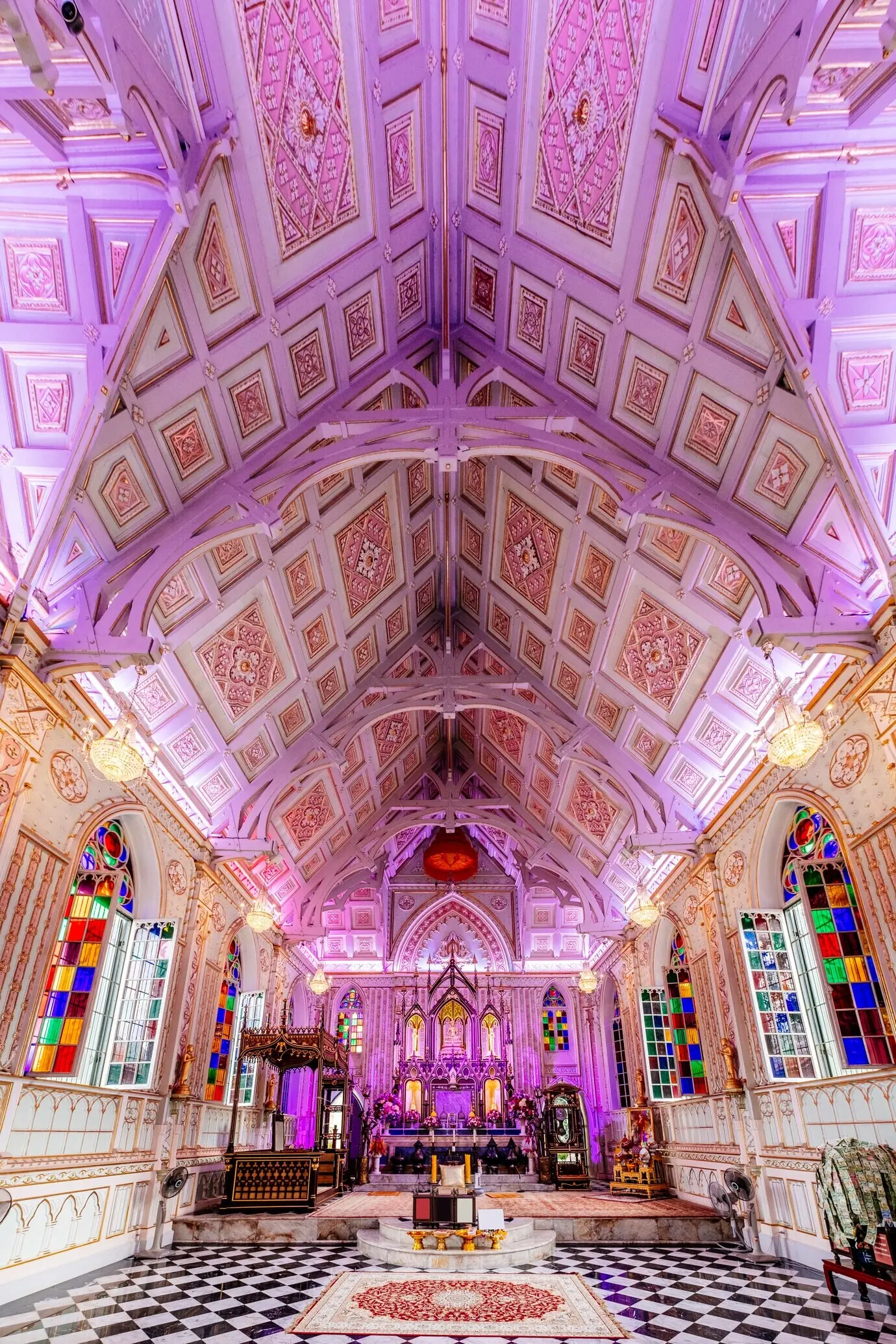 Interior of a church in Thailand with a beautiful ceiling.